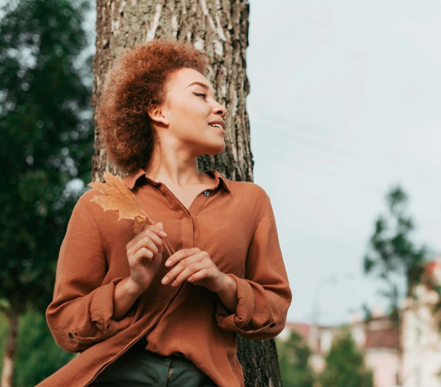 Woman outdoors enjoying balanced hormones and better energy