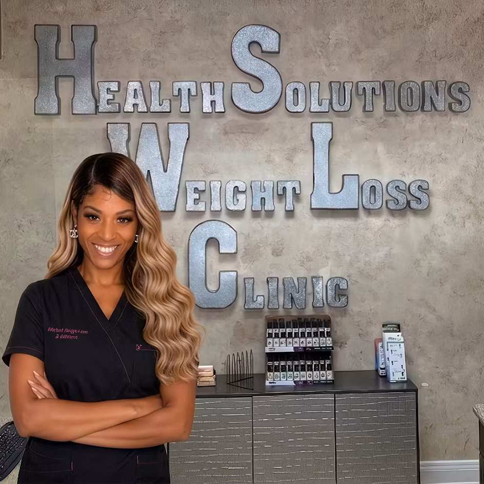 Health Solutions Weight Loss Clinic team member standing in the clinic office